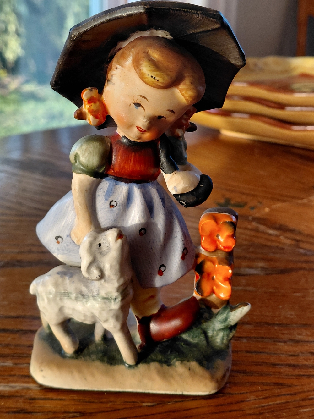 Hand-Painted Ceramic Girl Figurine in Blue Dress